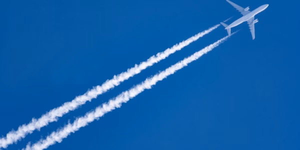 The airplane flying in the blue sky in Japan